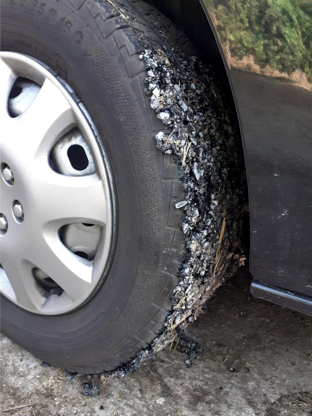Louise said: "Both passenger-side tyres were completely covered in melted Tarmac" Louise said: "Both passenger-side tyres were completely covered in melted Tarmac"